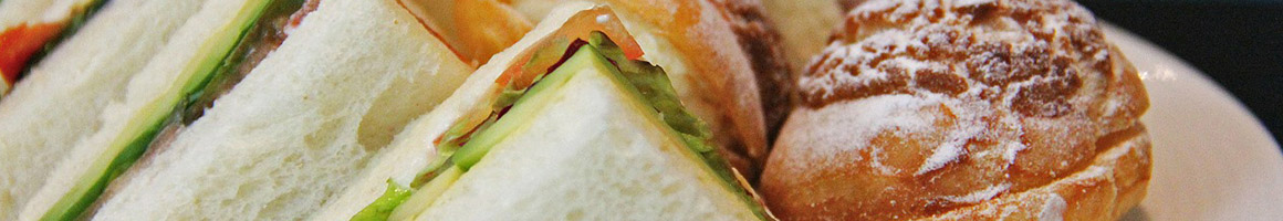 Eating American (New) Barbeque Sandwich at Rib City Littleton restaurant in Littleton, CO.